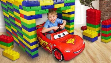Jim is building a big lego garage for his beautiful red car