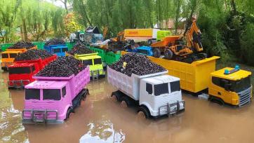 Colorful Toy Dump Trucks Working in Mud - Construction Vehicles for Kids
