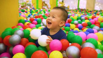 Colorful Ball Pit Adventure Filled with Laughter and Joy
