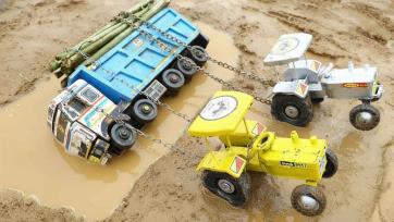 Toy Tractor Saves Stuck Dump Truck in Mud - Fun Construction Play for Kids